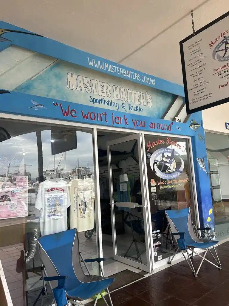 A storefront for 'Master Baiter's Sportfishing & Tackle' in Puerto Vallarta, Mexico, features the slogan 'We won't jerk you…
