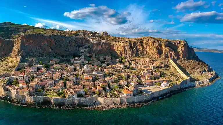 Monemvasia's medieval walls still hold true 15 centuries later, with the western gate guarding the sole road to town. A…