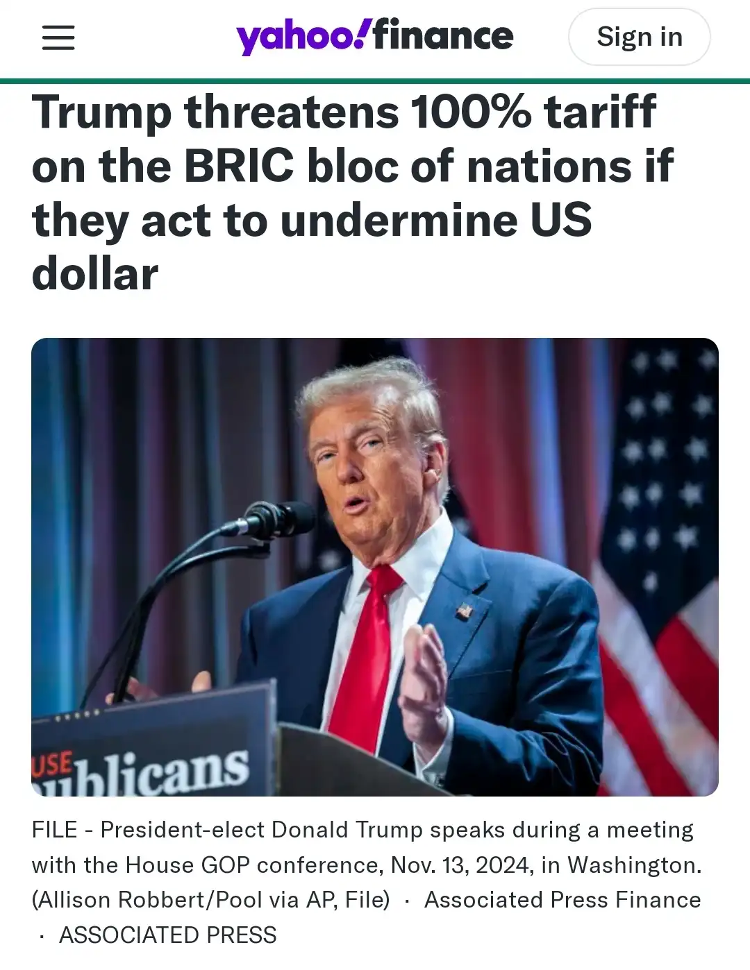 A screenshot of a Yahoo Finance article shows a photo of Donald Trump speaking at a podium with an American flag behind him…