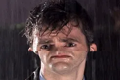 Six identical frames show a man with wet, disheveled hair and a pained, tear-streaked face standing in the rain. The…