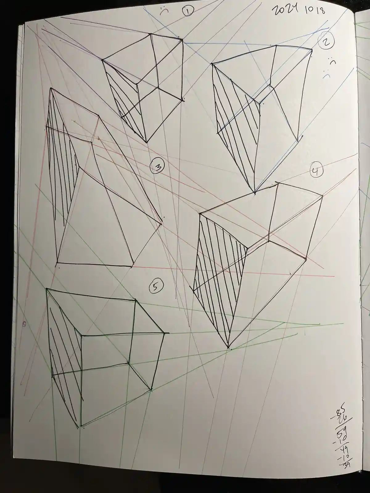 A hand-drawn sketch in a notebook shows five numbered geometric shapes, likely cubes or diamonds, rendered in perspective…