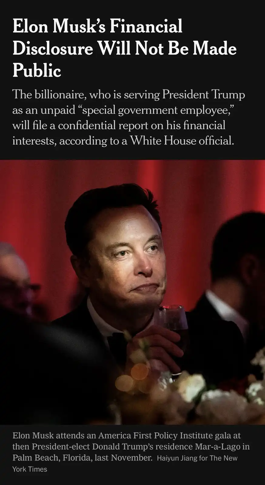 The image shows Elon Musk in a formal black tuxedo holding a glass, looking pensive against a red backdrop. Overlaid text…