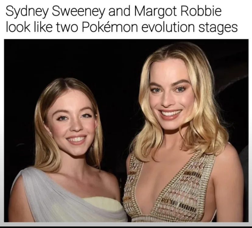 Two women, Sydney Sweeney on the left and Margot Robbie on the right, are smiling and posing together at an event. Sweeney…