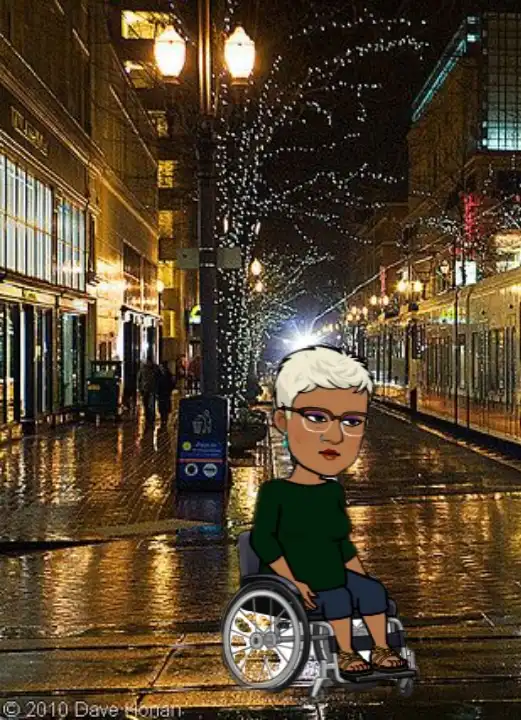 A cartoon-style depiction of a person with short white hair and glasses sitting in a wheelchair on a wet, illuminated city…