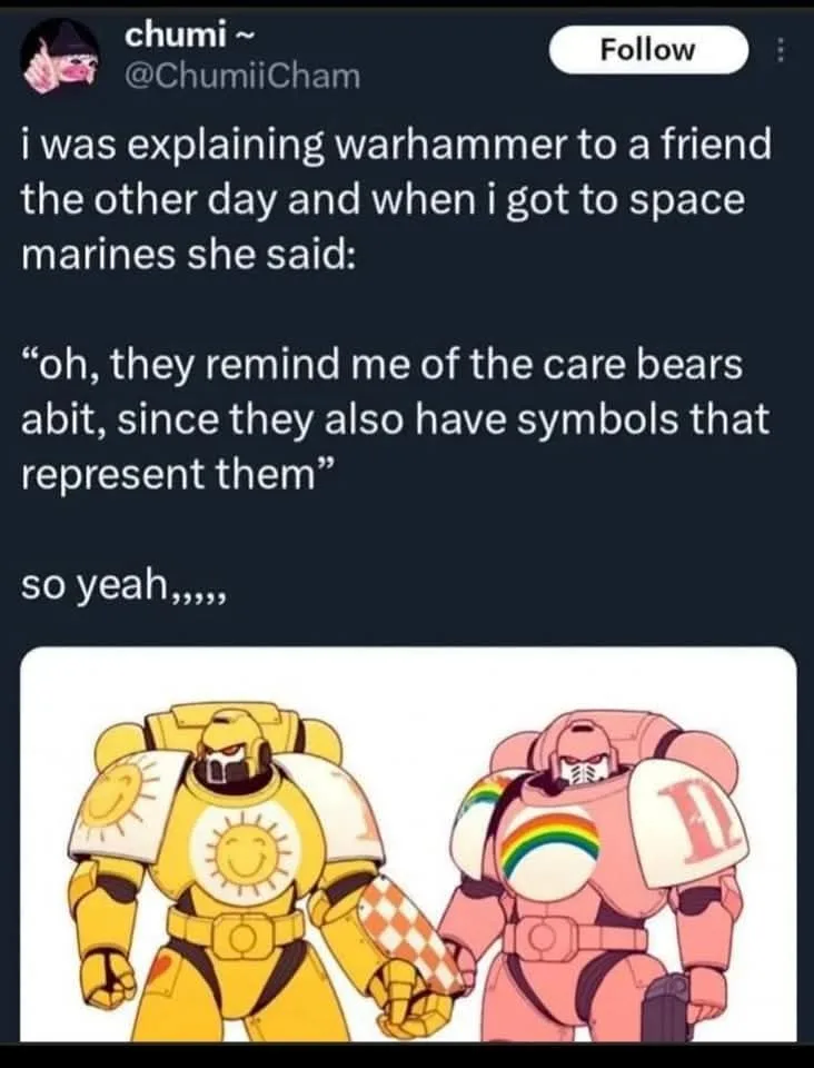 The image shows two cartoonish, armored figures resembling Space Marines from Warhammer 40,000. The figure on the left is…
