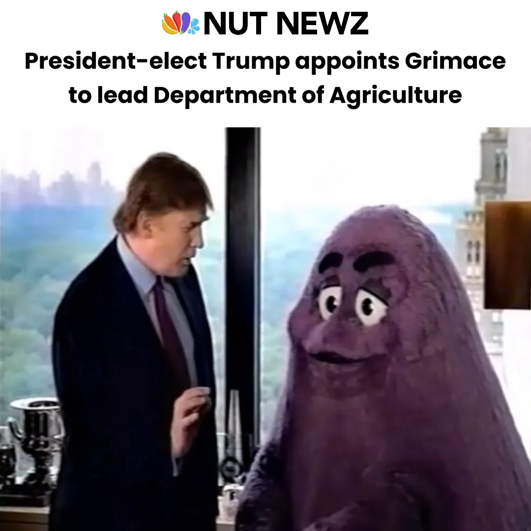 A man in a suit stands beside a purple, furry, cartoonish character with large eyes and a grumpy expression. Above them…