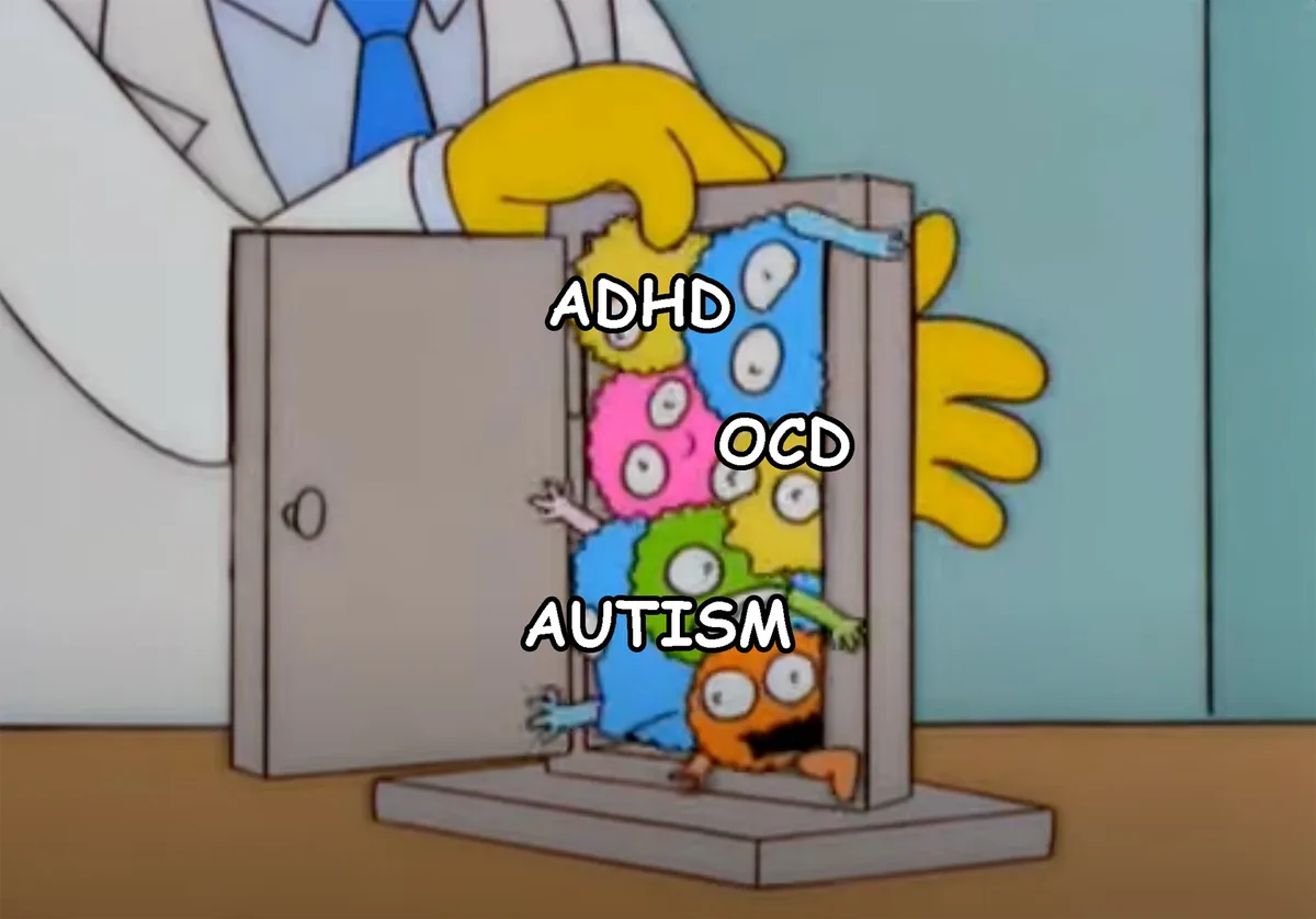 A cartoon doctor in a white coat opens a small cabinet to reveal several colorful, multi-eyed, furry monsters bursting out…