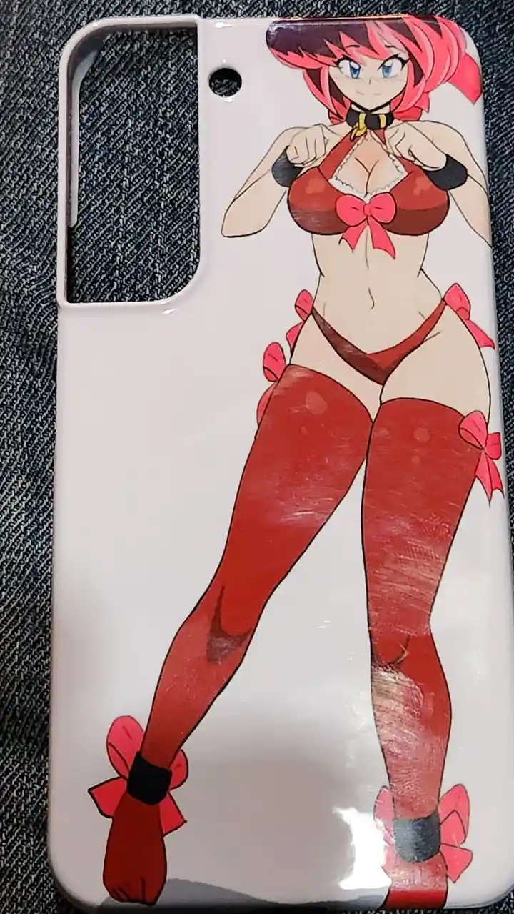 A white smartphone case with a full-body anime illustration of a female character with pink hair and blue eyes, wearing a…
