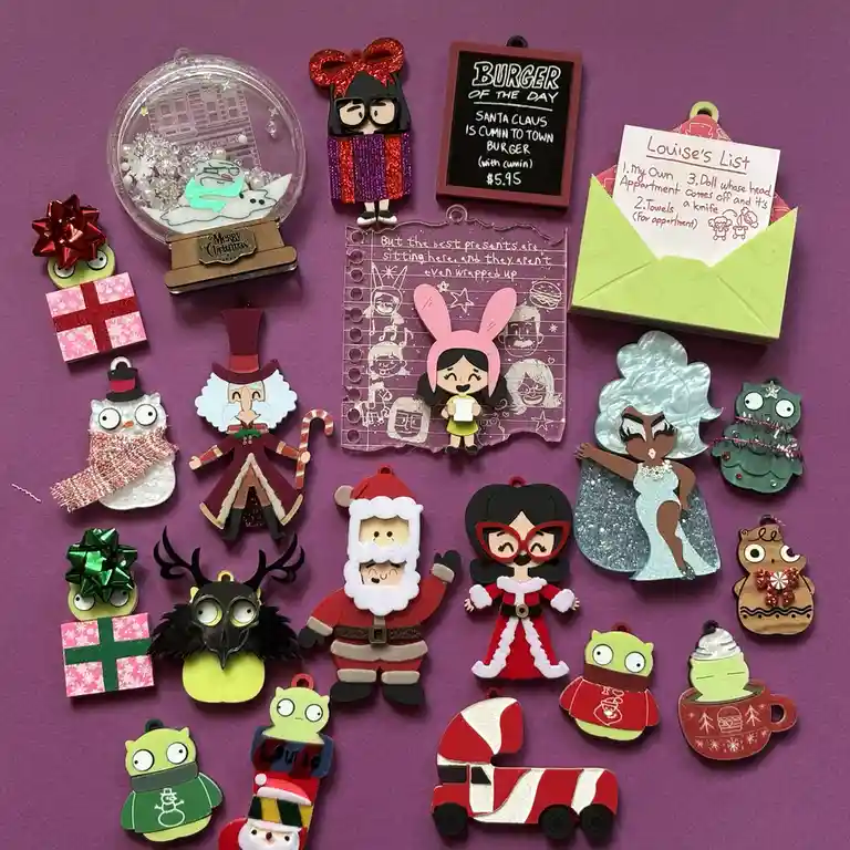 A collection of handmade Christmas ornaments featuring characters from the animated show 'Rick and Morty', including Santa…