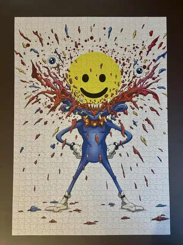 A completed jigsaw puzzle depicts a cartoonish blue-suited figure with a yellow smiley face head, exploding with red and…