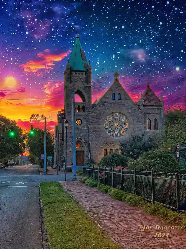 A highly saturated, digitally enhanced photo shows a stone church with a green spire and rose window under a surreal sky…
