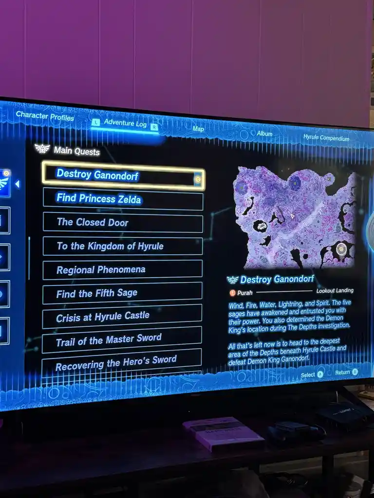 A screenshot of The Legend of Zelda: Tears of the Kingdom's adventure log, showing the 'Destroy Ganondorf' main quest…