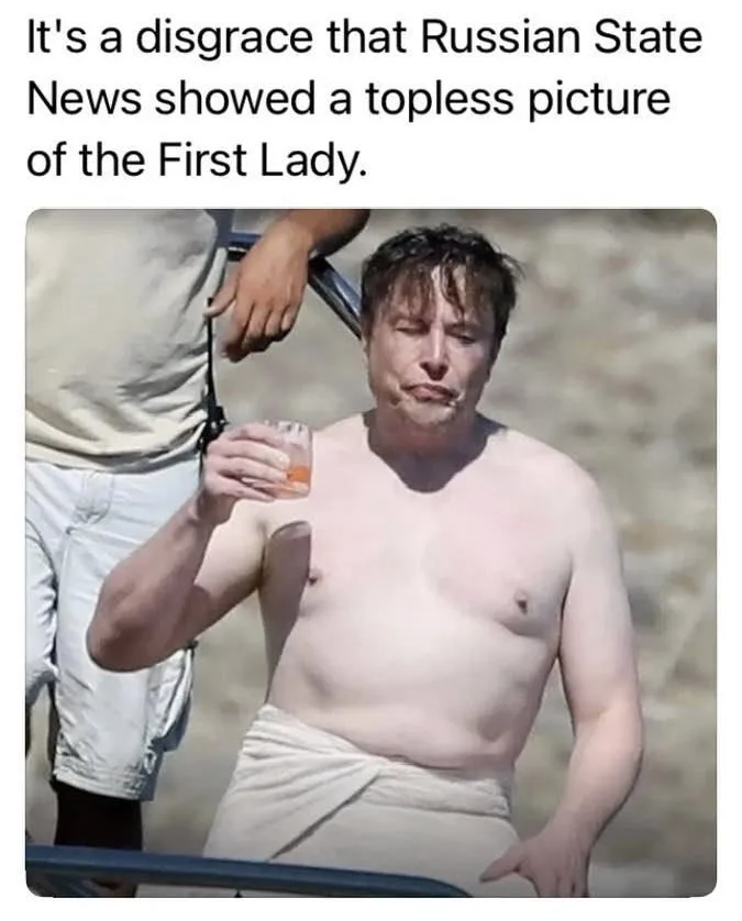 A shirtless man with messy hair, wearing a white towel around his waist, holds a glass while looking displeased. Another…