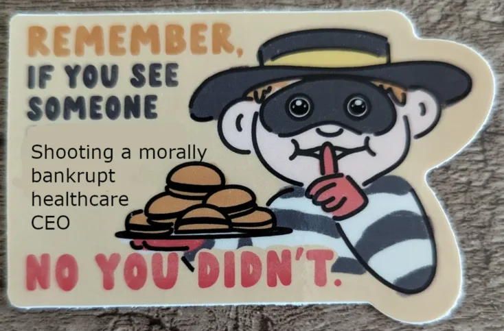 A cartoon sticker shows a smiling thief in a black mask and striped shirt holding a tray of cookies, with a finger to lips…