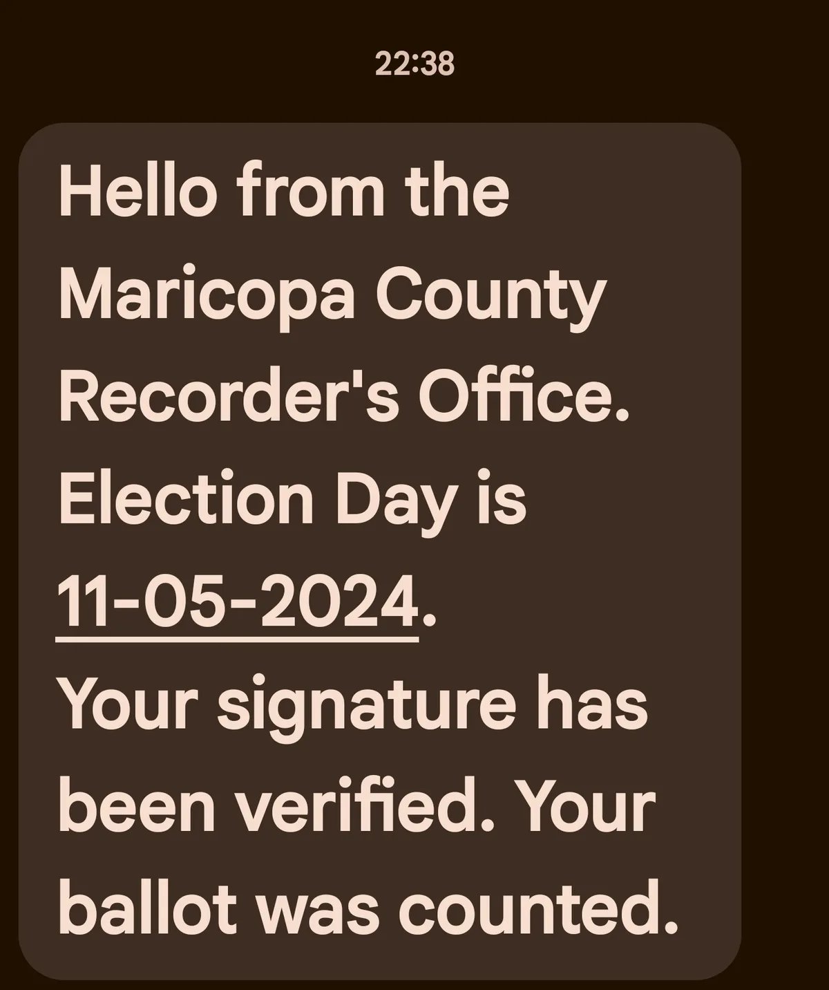 A screenshot of a notification from the Maricopa County Recorder's Office, displayed on a dark brown background with light…