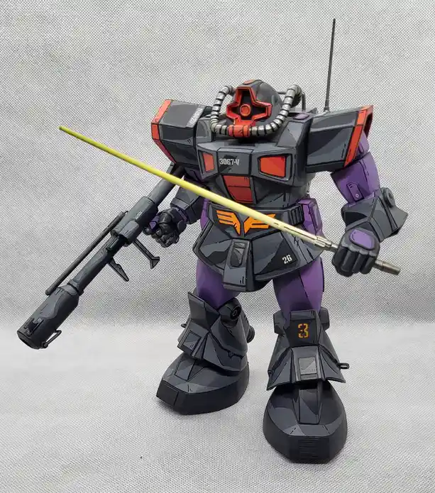 A custom-painted model of a black and purple mobile suit, likely a Zaku, stands against a gray textured background. It holds…