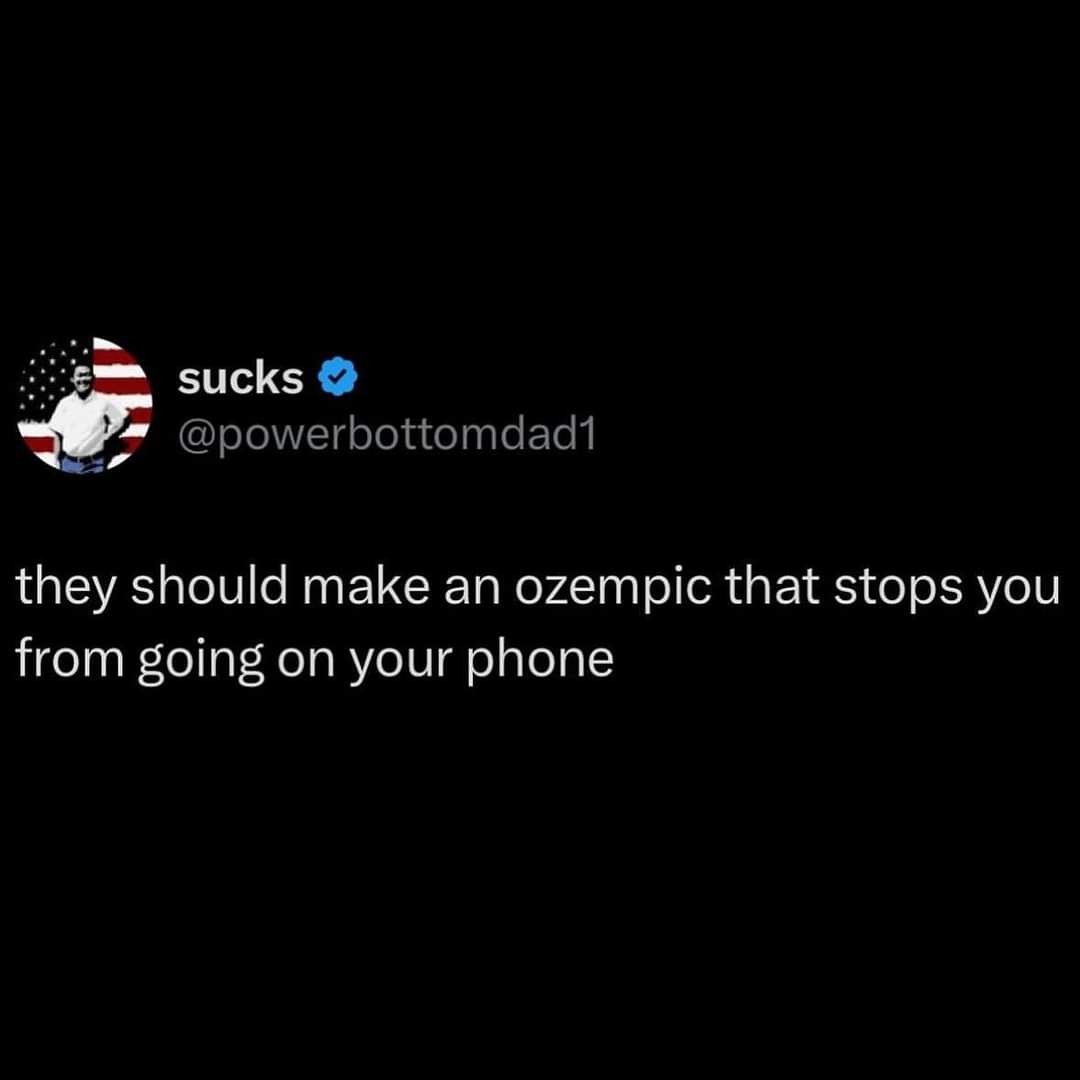 A screenshot of a tweet from a user named 'sucks' with a profile picture of a man against an American flag background. The…