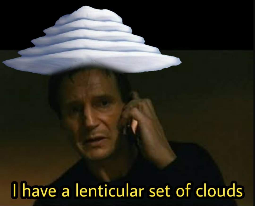 A man is on the phone with a large, layered, white lenticular cloud digitally placed on his head. The text at the bottom…