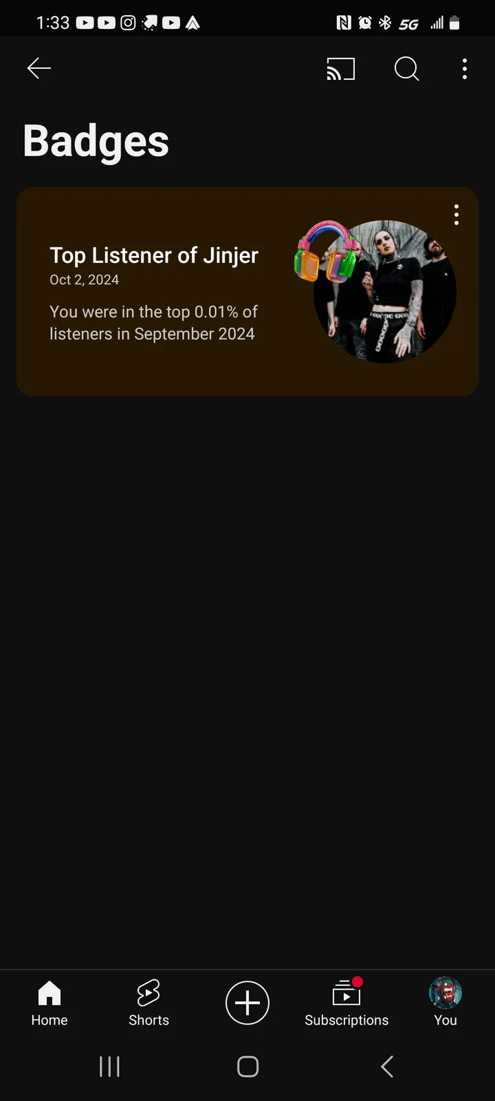 A screenshot of a music app's 'Badges' page showing a 'Top Listener of Jinjer' award dated Oct 2, 2024, which states the…