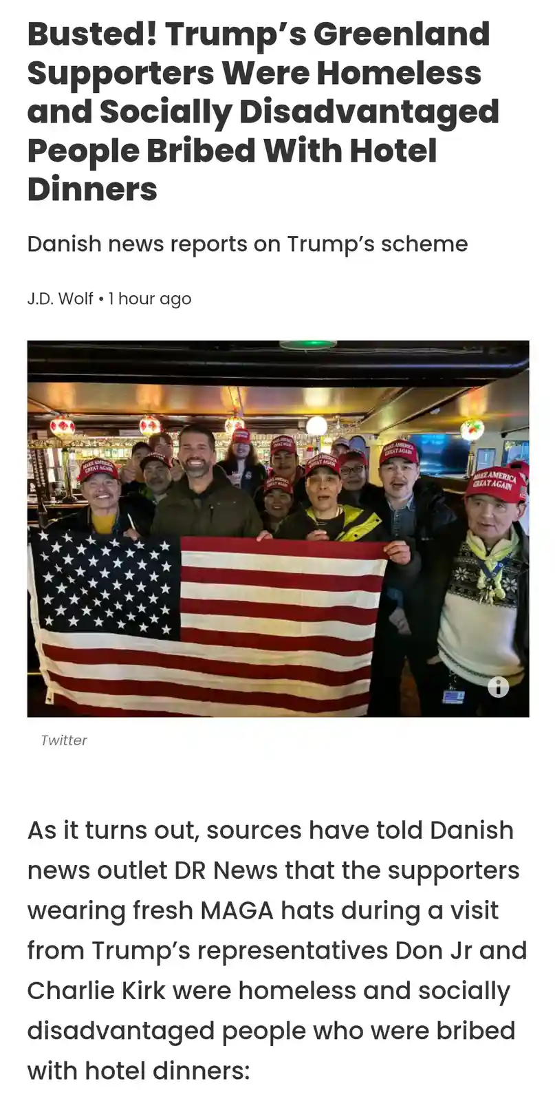 A group of people wearing red 'Make America Great Again' hats are posing together indoors, holding a large American flag…