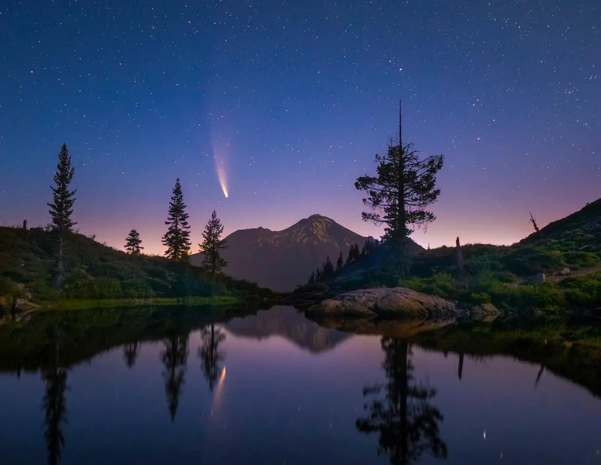 A serene night landscape featuring a starry sky, a prominent comet with a glowing tail, distant mountains, and tall pine…