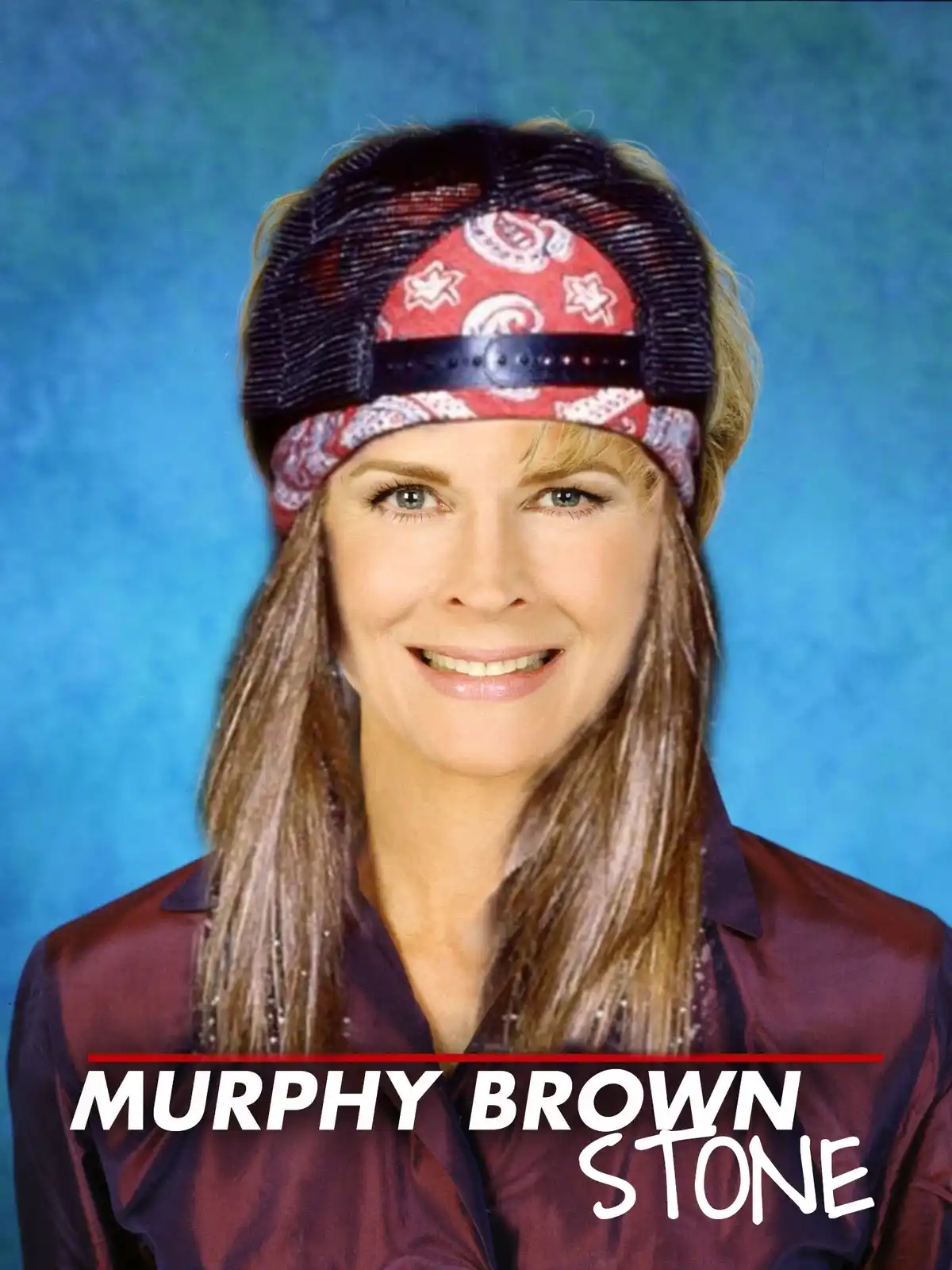 A photo of actress Murphy Brown smiling, wearing a red and white patterned bandana over a black trucker hat, against a blue…