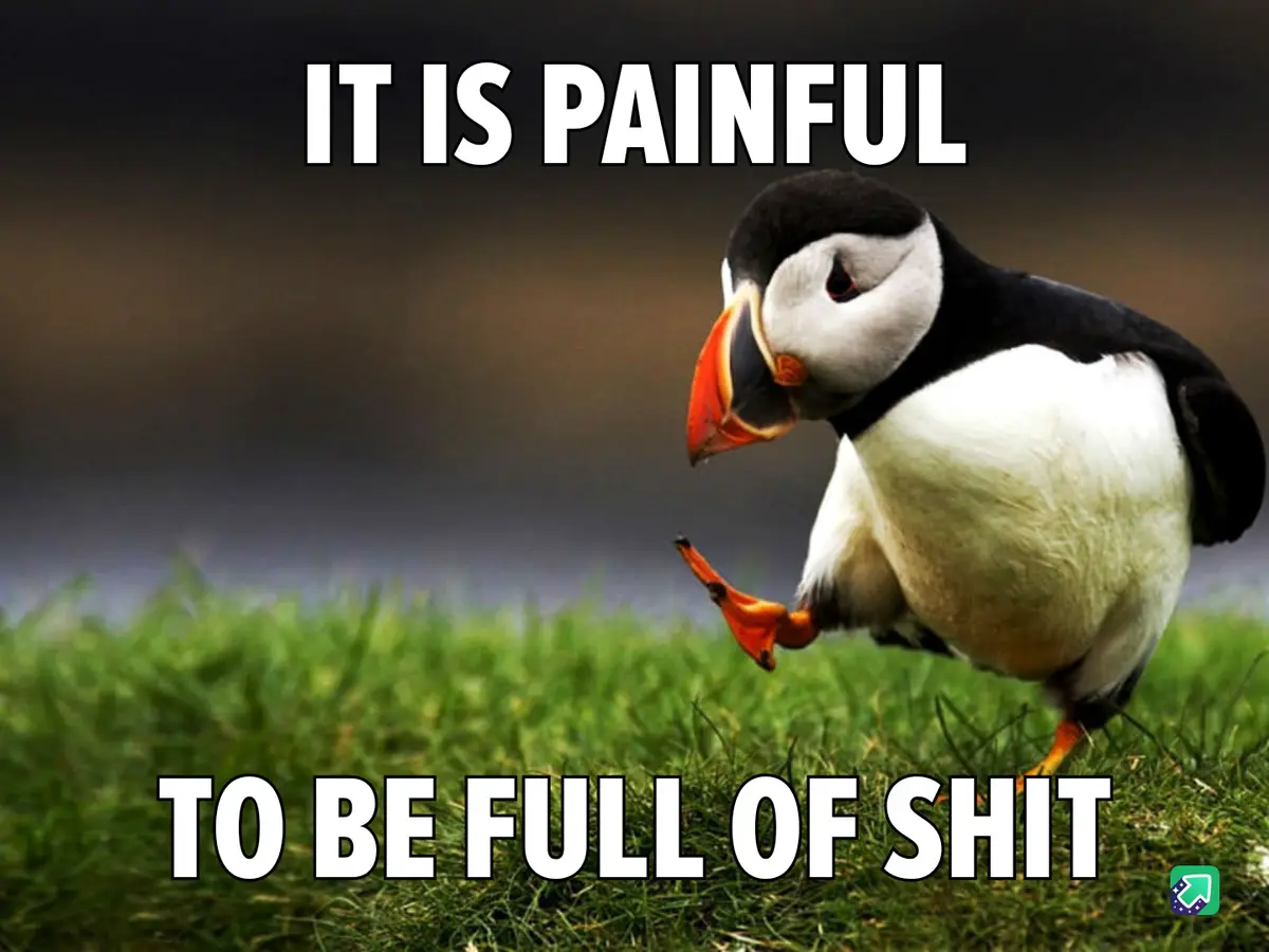 A puffin stands on green grass, looking down at its orange foot with a pained expression. White bold text overlays the…