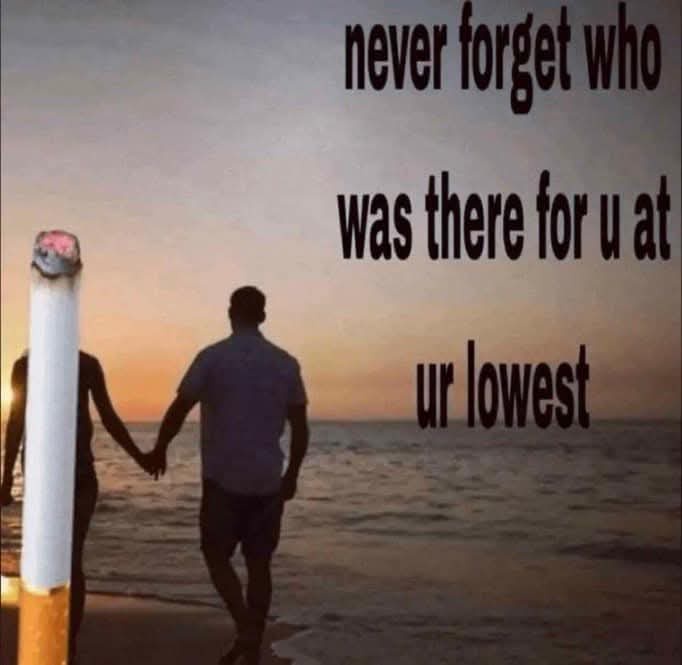 A romantic sunset photo of two people holding hands while walking along a beach, but the person on the left is visibly…