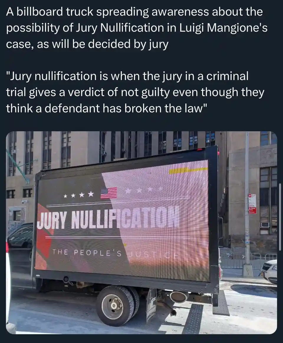 A large digital billboard truck displays the text 'JURY NULLIFICATION' and 'THE PEOPLE'S JUSTICE' against a patriotic…
