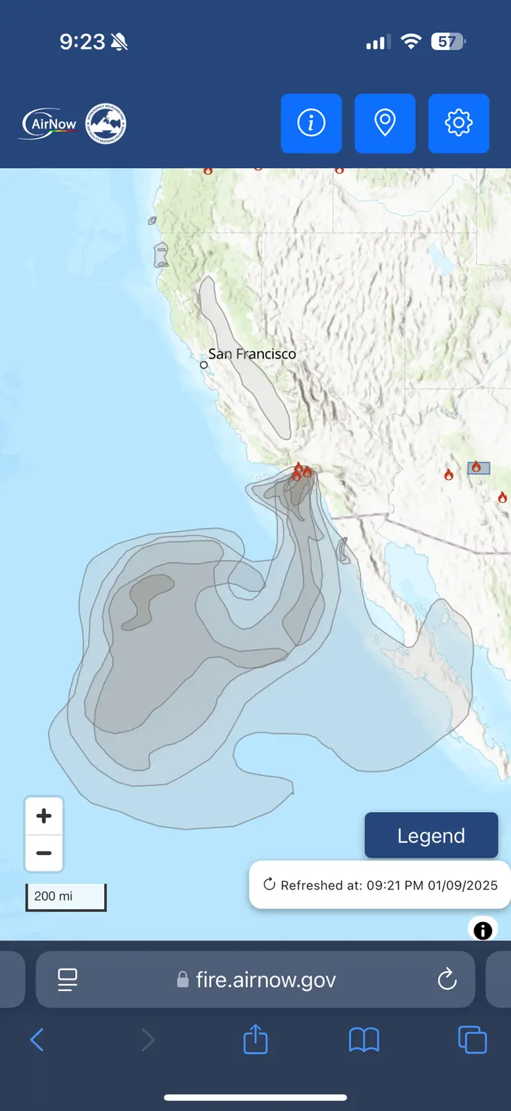 a screenshot of the airnow.gov wildfire smoke map shows a large grey smoke plume spreading over the pacific ocean near…