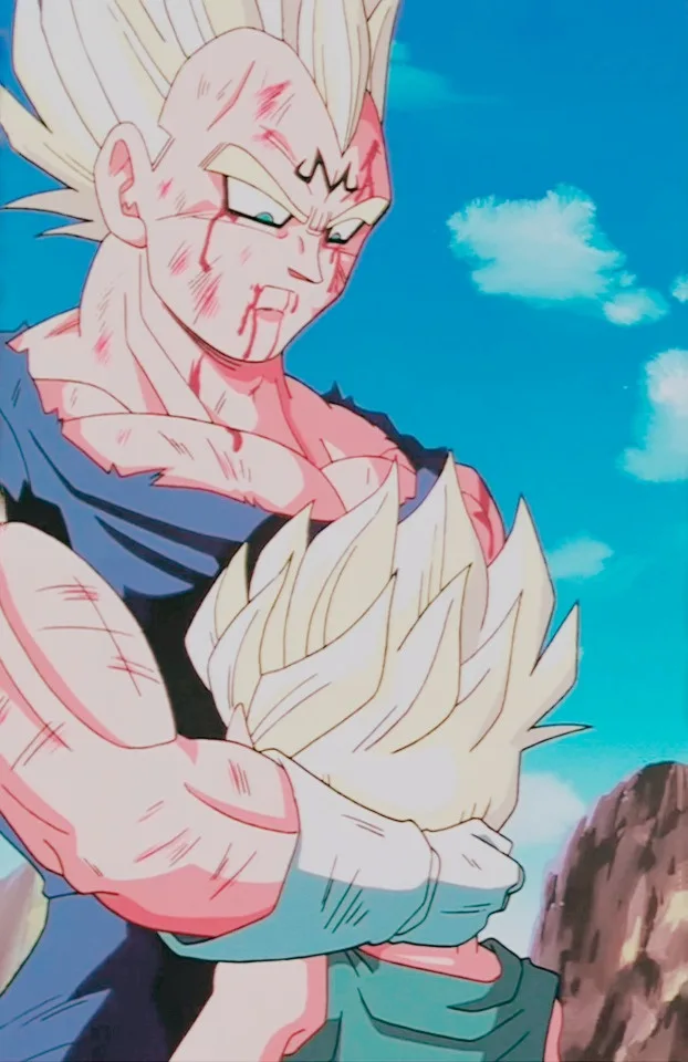 A visibly battered and bloodied anime character with spiky blonde hair, wearing a blue and green outfit, stands with a…