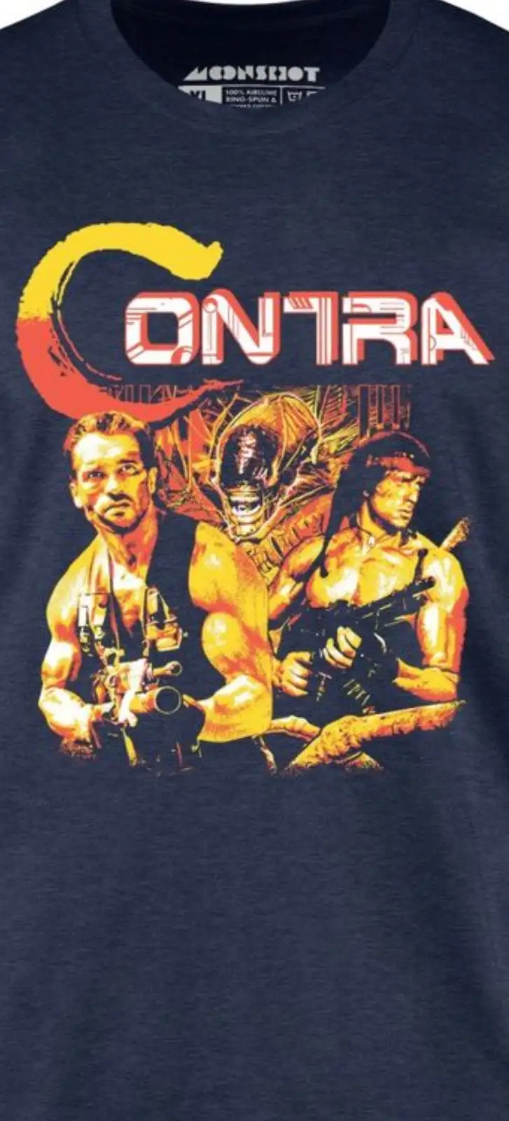 A dark blue t-shirt features a graphic of the 1980s video game Contra, showing two muscular soldiers holding guns with an…