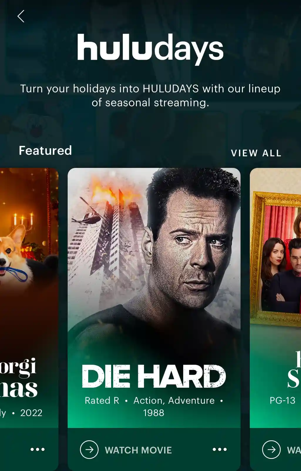 A screenshot of the Hulu app's 'Huludays' holiday streaming page, featuring a movie tile for 'Die Hard' with a close-up of…