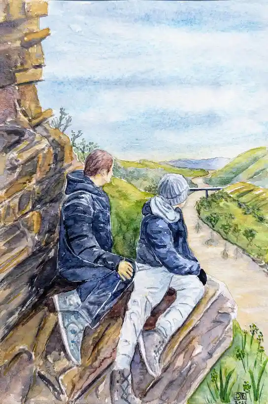 A watercolor painting shows two people sitting side-by-side on a rocky ledge overlooking a winding valley. Both are dressed…