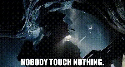 A six-panel meme strip showing a soldier in a dark, cave-like setting repeatedly shouting 'NOBODY TOUCH NOTHING.' The top…