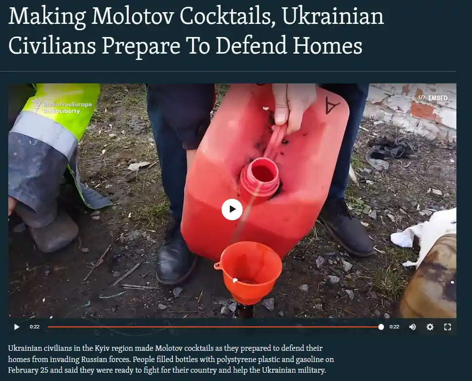 A video still shows a person pouring liquid from a red plastic jerrycan into a small orange funnel on muddy ground. Another…