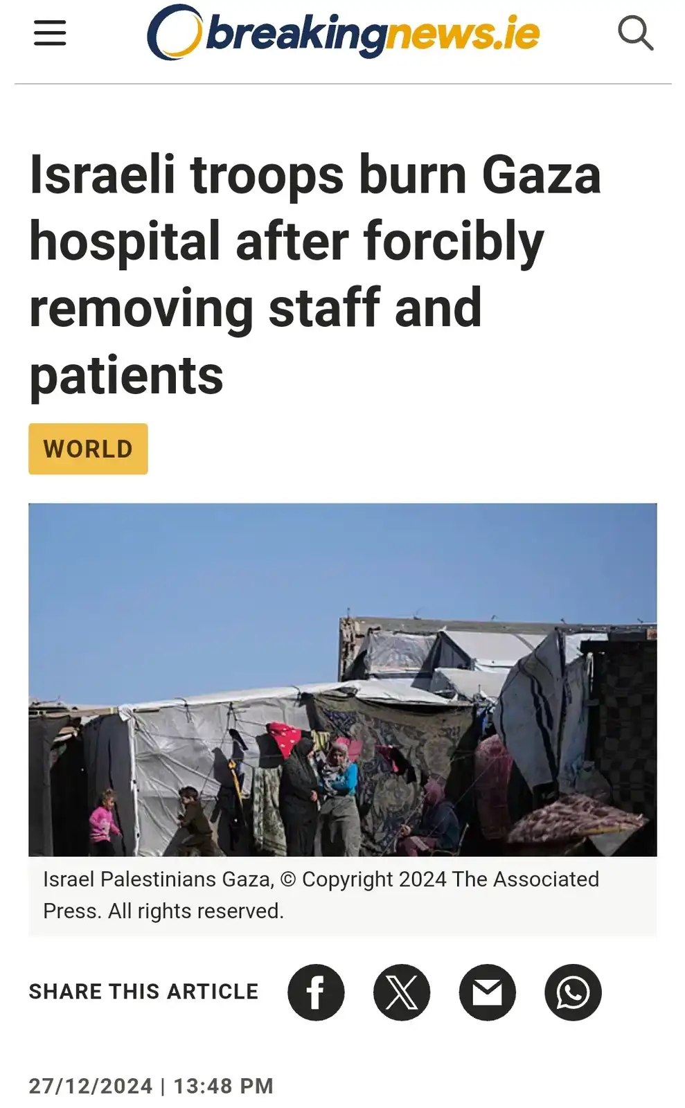 A screenshot of a breaking news article from breakingnews.ie with a headline about Israeli troops burning a Gaza hospital…