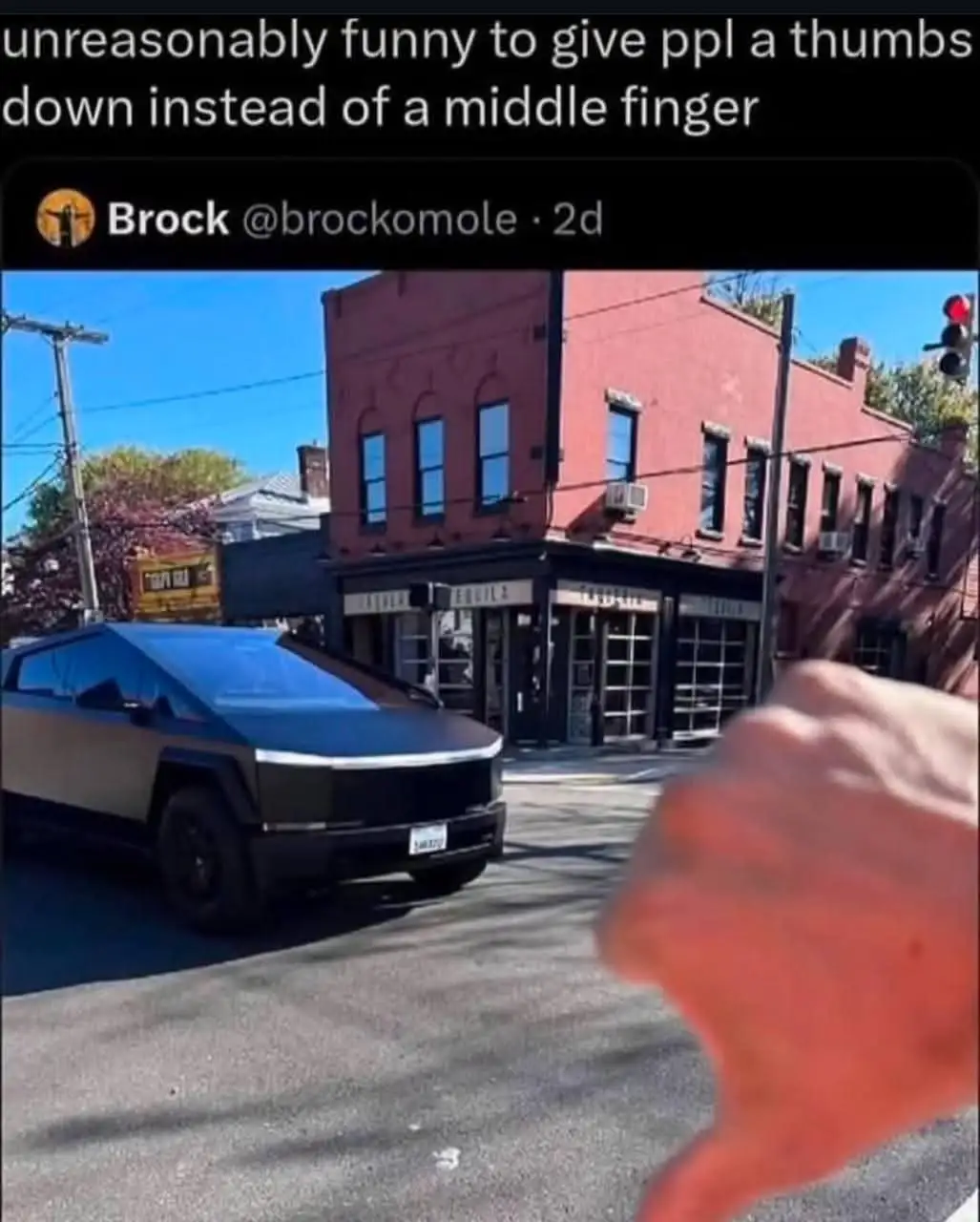 A screenshot of a social media post by 'Brock @brockomole' shows a blue and black Tesla Cybertruck parked on a street corner…