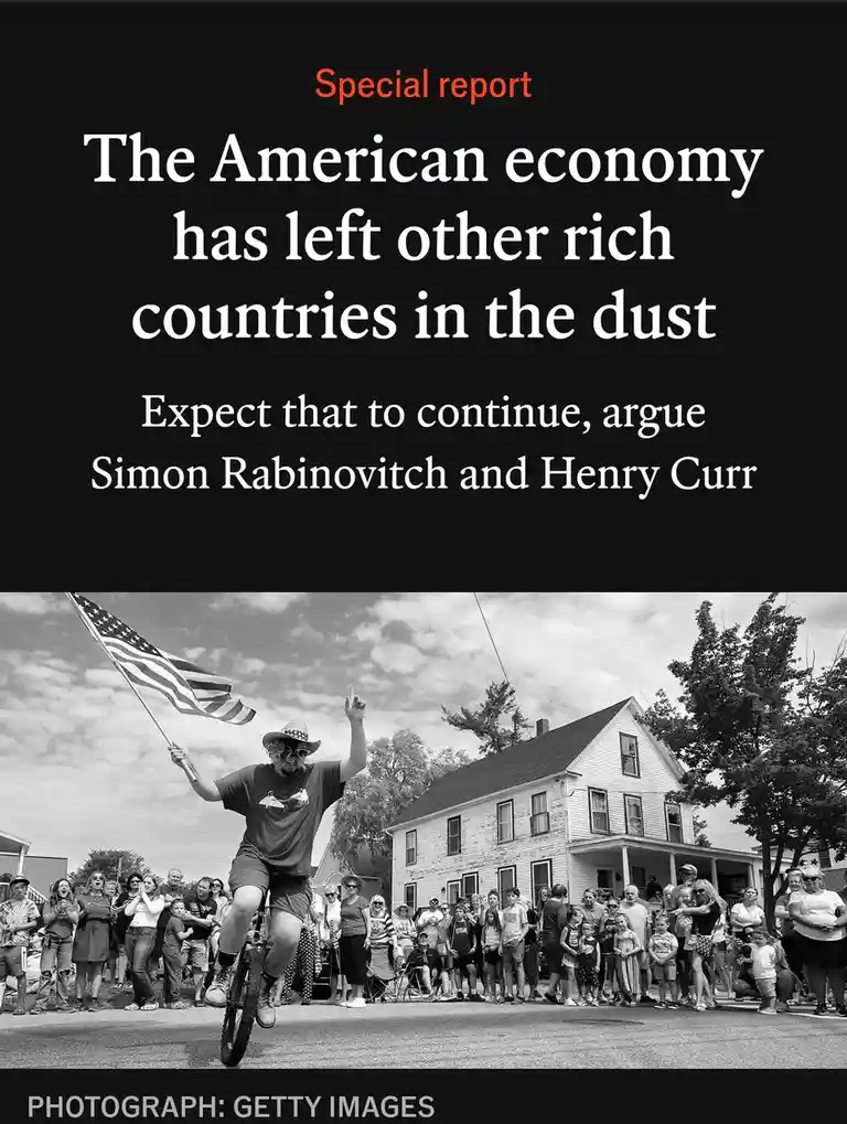 A black-and-white photo shows a man on a unicycle, waving an American flag and pointing upward, while a crowd watches him in…
