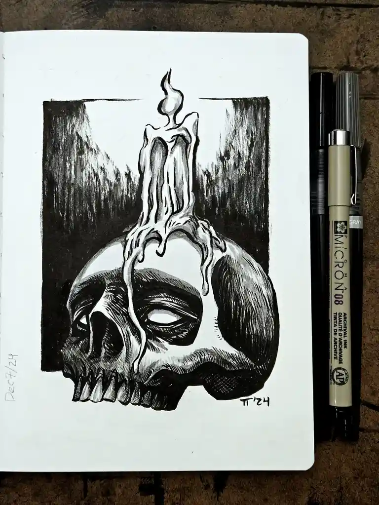 A black-and-white ink drawing in a sketchbook shows a human skull with a melting candle emerging from its forehead, dripping…