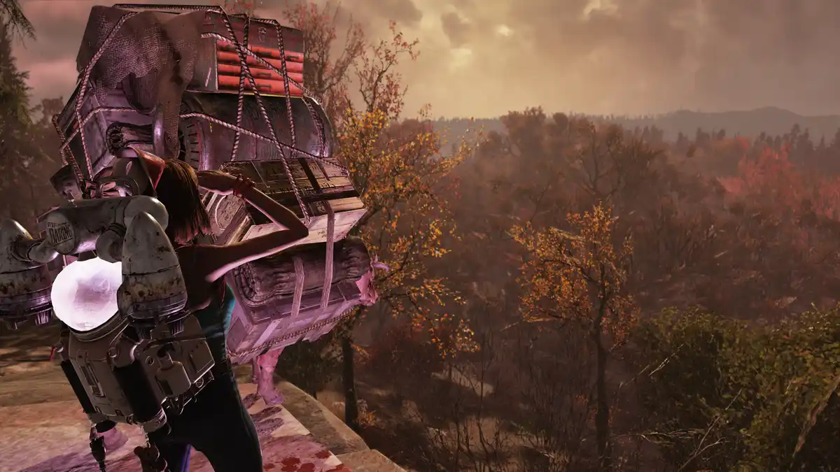 A character from the video game Fallout 4, seen from behind, is carrying an enormous, heavily strapped pile of luggage and…