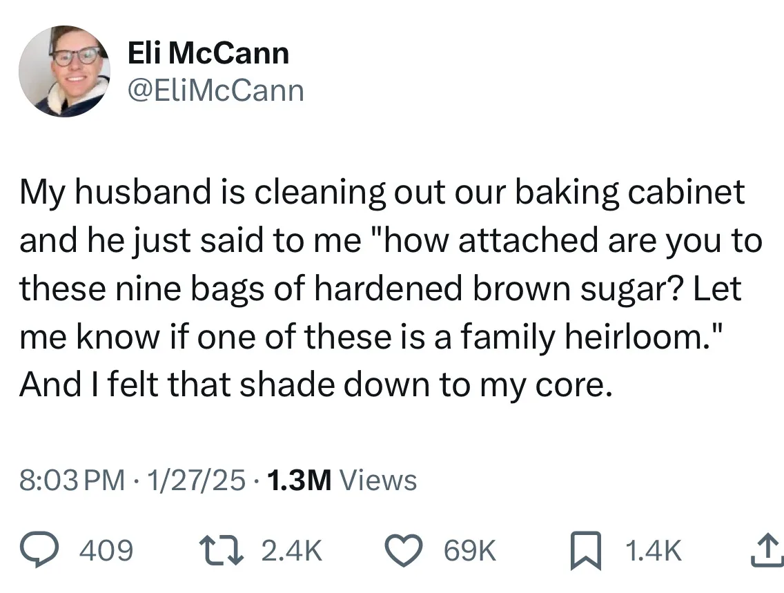 A screenshot of a tweet by Eli McCann showing a humorous domestic situation where her husband questions her attachment to…