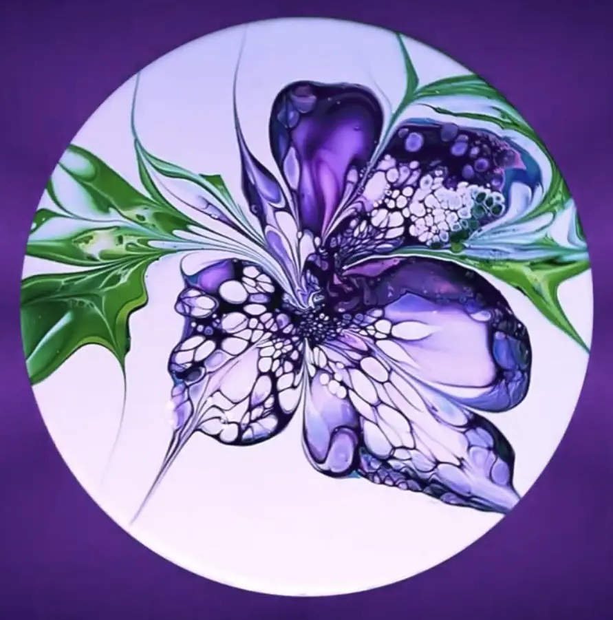 A circular abstract painting depicts a stylized purple and green butterfly with intricate, bubble-like patterns on its…