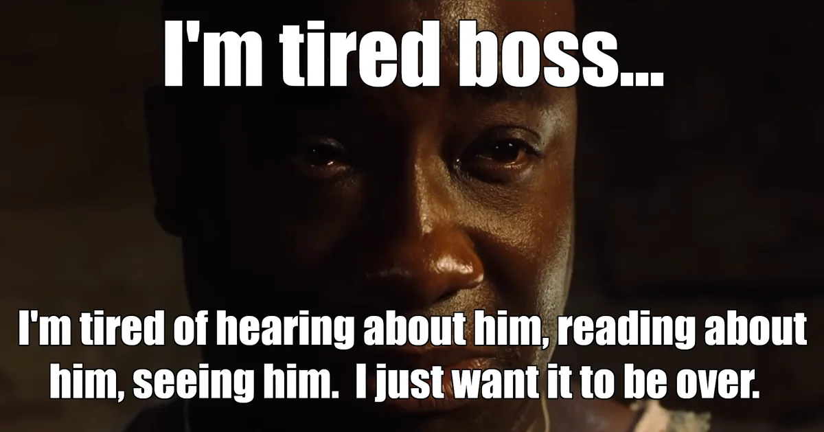 A close-up shot of a man with a weary, exhausted expression, looking directly at the viewer. The image has white text…