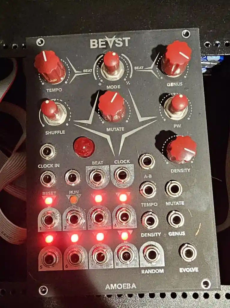 A close-up of a black Eurorack-style modular synthesizer module labeled 'BEAST' at the top and 'AMOEBA' at the bottom…