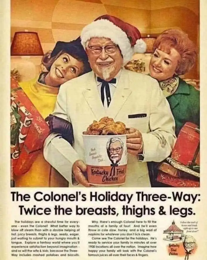 A vintage 1960s Kentucky Fried Chicken holiday advertisement featuring Colonel Harland Sanders wearing a Santa hat, holding…