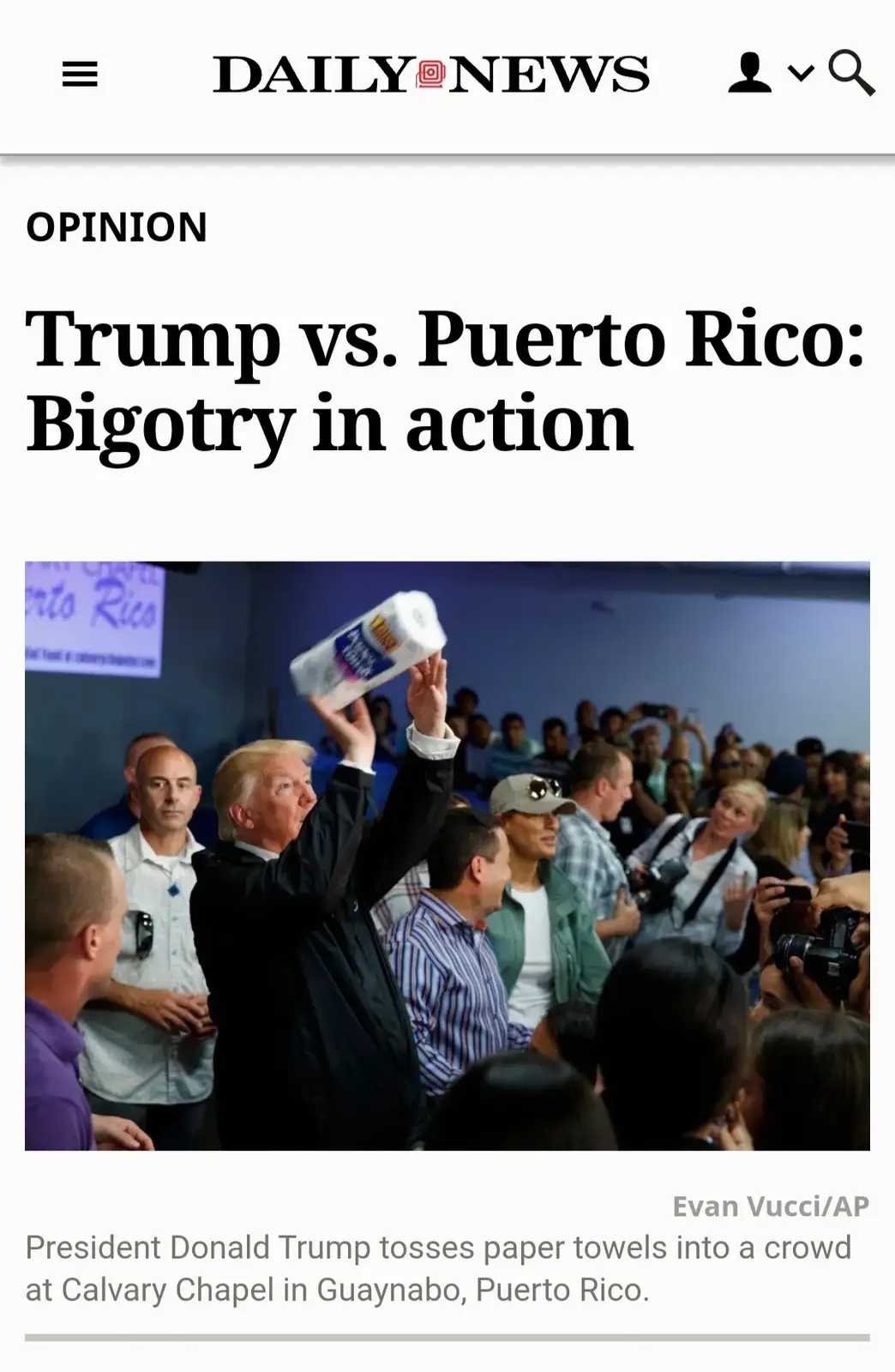 A screenshot of a Daily News opinion article shows Donald Trump holding up a roll of paper towels at a rally in Puerto Rico…
