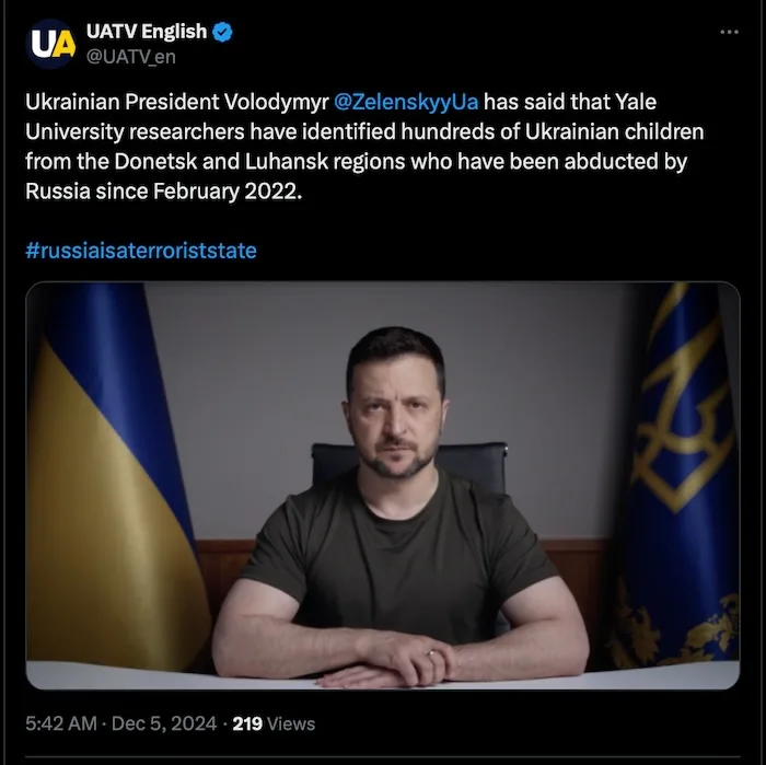 A screenshot of a tweet from UATV English shows Ukrainian President Volodymyr Zelenskyy seated at a desk with Ukrainian…