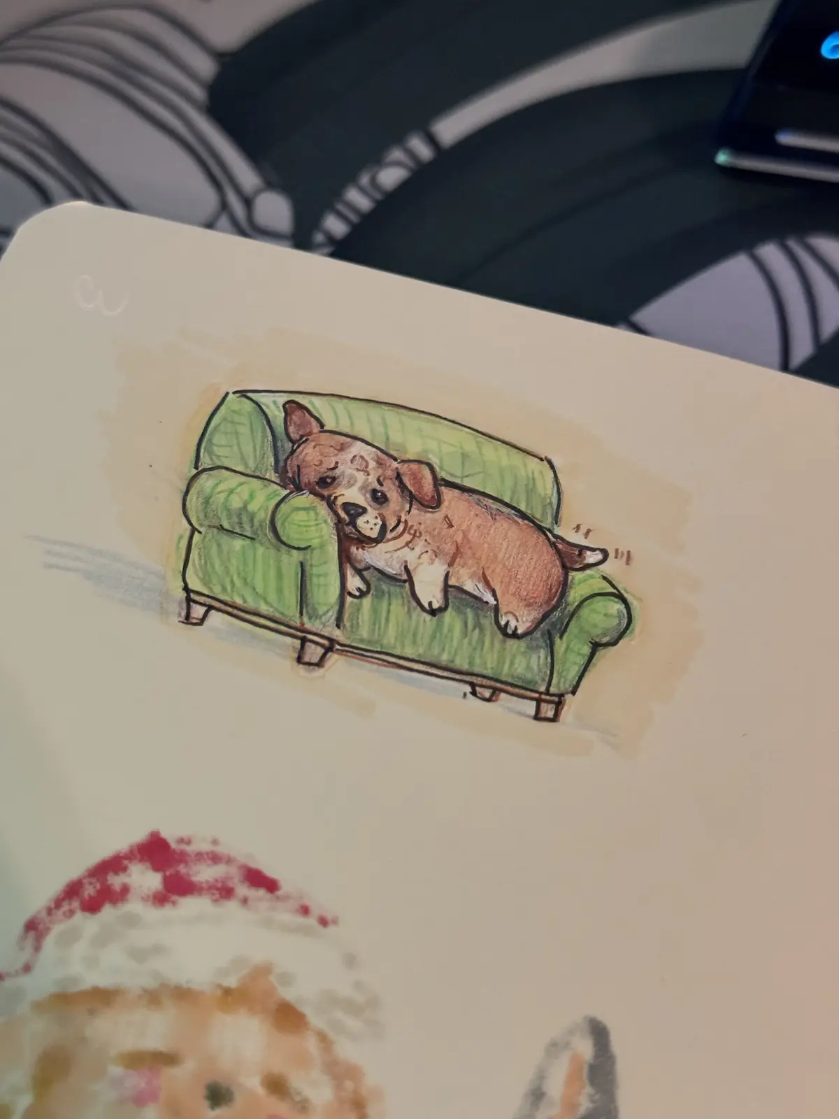 A hand-drawn watercolor illustration on paper shows a brown and white corgi dog lying stretched out on a green couch…