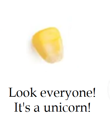 A single yellow corn kernel is shown against a plain white background, with bold black text overlaid below it reading 'Look…
